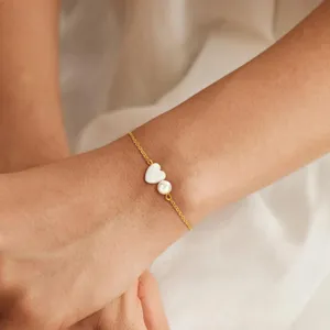 Elegante gouden ketting armband met witte hart hanger en parel voor dames dagelijkse mode