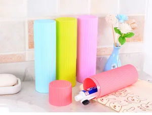 Detailed macro view of colorful portable toothbrush cases with ribbed non-slip texture