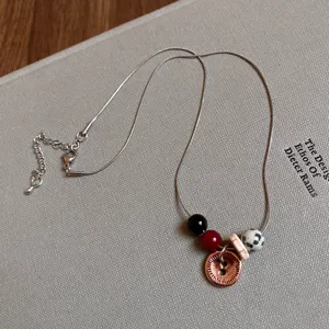 Collana catena serpente in acciaio inossidabile con perline e ciondolo bottone donna