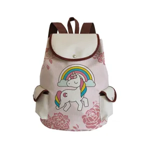 Detailed view of the cute pink canvas backpack featuring a unicorn and rainbow print design.