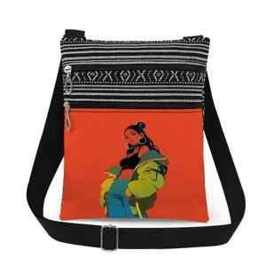 Detailed view of canvas crossbody messenger bag with double zippers and stylish girl graphic print.