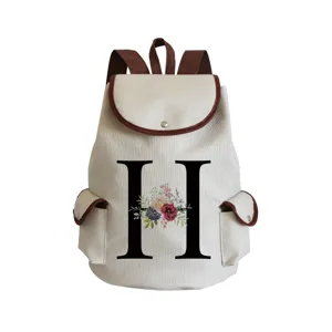 Canvas backpack with letter print and floral design, stylish casual daypack for women.