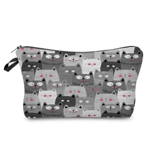 Cute cat print cosmetic bag detail, featuring soft fabric texture and durable metal zipper.
