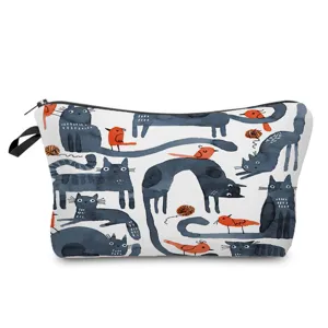 Cute watercolor black cat print detail on fabric cosmetic bag, compact storage pouch closeup.