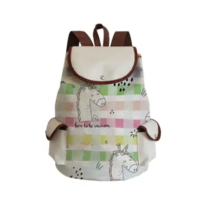Canvas casual backpack with cute unicorn print, pastel plaid pattern and brown leather trim.