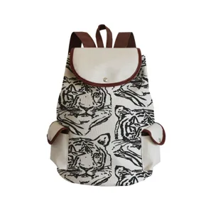 Canvas backpack with tiger face print and brown trim, ideal for daily school and casual use.