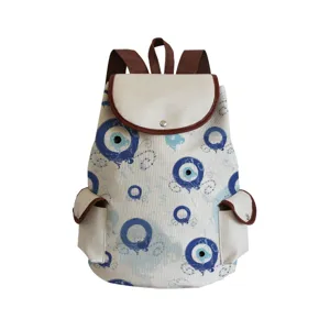 Canvas backpack featuring a stylish blue evil eye print pattern with durable brown straps and trim.