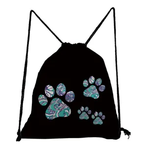 Close-up detail of black drawstring backpack featuring stylish teal and purple paisley cat paw prints.