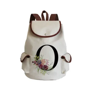 Canvas backpack featuring letter O and floral print, stylish student daypack for women.