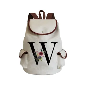 Canvas casual backpack with floral letter W print, stylish brown trim and pockets for women.