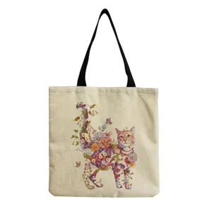 Detailed view of floral cat print canvas tote bag, large capacity lightweight shoulder bag.