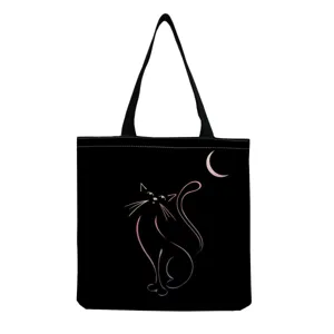 Black canvas tote bag with elegant cat and crescent moon line art print for daily casual use.