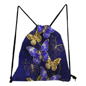 Close-up detail of blue and gold butterfly print on dark blue fabric of the drawstring bag.
