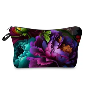 Vue détaillée de la trousse de maquillage à motif floral sombre, pivoines et fermeture éclair.
