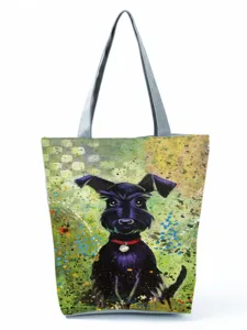 Canvas tote bag with cute black dog print, large capacity shoulder handbag for women daily.