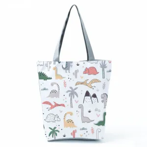 Vista di dettaglio della borsa tote in tela con stampa di dinosauro simpatico.