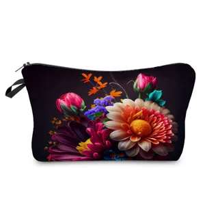 Trousse de maquillage motif floral sombre avec fermeture éclair et poignée voyage.