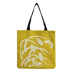 Yellow canvas tote bag with white floral and butterfly print, lightweight daily shoulder shopping bag.