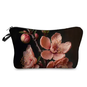 Chic pochette de maquillage imprimee de fleurs sombres, trousse de toilette portable et elegante.