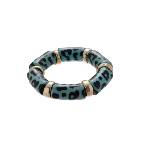 Stunning blue leopard print acrylic elastic bracelet with gold spacers for women fashion style.