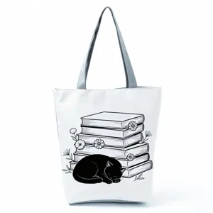 Black cat printed canvas tote bag, stylish washable casual shoulder shopping handbag.