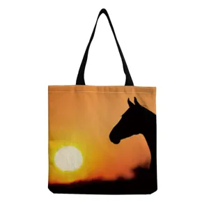 Detailed close-up view of the casual canvas tote bag with stunning sunset horse print.