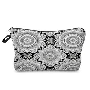 Mandala print detail view of the black and white cosmetic makeup storage pouch bag.