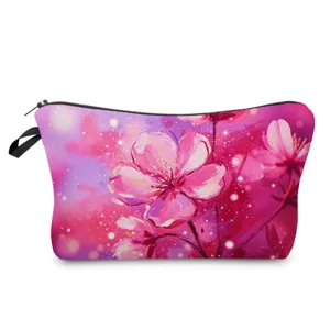 Detailed view of the vibrant pink floral print cosmetic pouch, featuring clear oil painting texture.