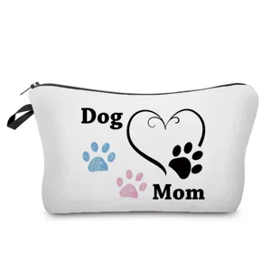 Vista detallada de bolsa de almacenamiento cosmética de lona blanca con lindo diseño de huella de perro.