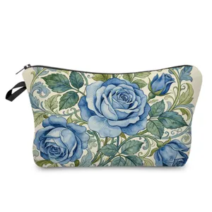 Detailed view of cosmetic bag with blue watercolor rose floral pattern and secure zipper closure.