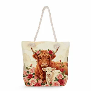 Detailed view of the Highland cow and floral print canvas tote bag with thick ropes.