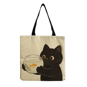Cute black cat print canvas tote bag detail view, featuring a lovely goldfish bowl graphic.