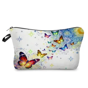 Detailed view of the cosmetic pouch showing vibrant watercolor butterfly and starry print texture.