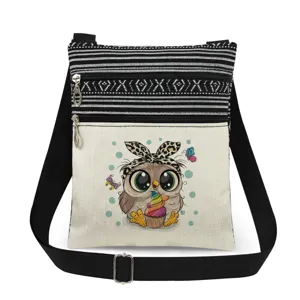 Close-up detail of the cute owl printed canvas crossbody bag with double zipper and black strap.