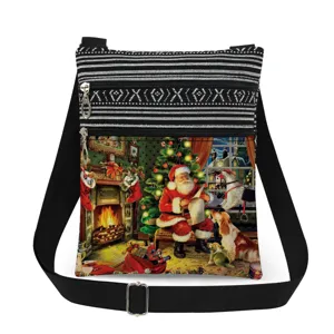 Close-up detail of the Christmas print crossbody bag featuring double zippers and black strap.