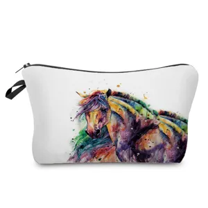 Detailed view of the vibrant watercolor horse print on a portable soft makeup pouch fabric texture.