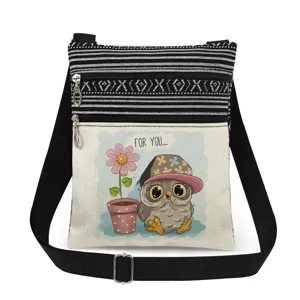 Canvas crossbody bag with black white stripes, cute owl print and adjustable strap for daily use.