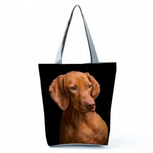 Stylish dog print canvas tote bag with large capacity for daily travel and casual shopping.