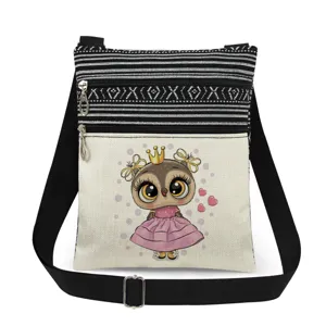 Cute owl print crossbody bag with black white stripes and adjustable shoulder strap.