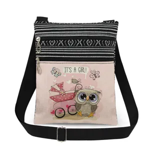 Canvas crossbody bag detail showing black white stripes and cute owl pink print.