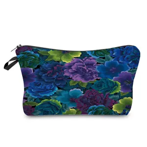 Floral print cosmetic bag close-up showing vibrant blue and purple flowers with zipper.