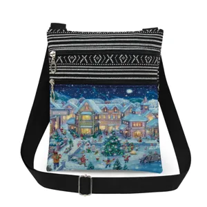 Christmas print crossbody bag detail showing double zipper pockets and adjustable black strap.