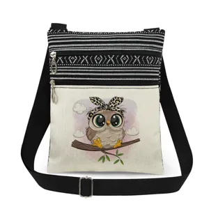 Small canvas crossbody bag featuring cute owl print and stylish black white stripes.