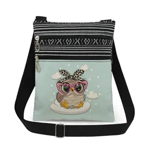 Cute owl print crossbody bag detail, double zipper compartments, and adjustable black strap.