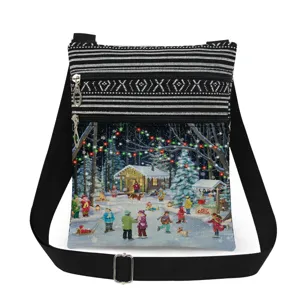 Close-up detail of the Christmas winter scene print and double zippers on the canvas bag.
