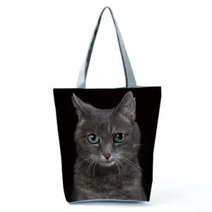 Black tote bag with cute grey cat print, large capacity casual shoulder bag for daily use.
