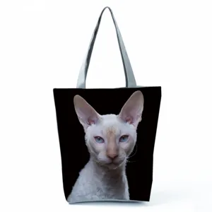 Black cat print canvas zipper tote bag, large capacity casual shoulder bag detail view.