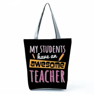 Canvas tote bag for teachers with inspirational print and large capacity design daily use.