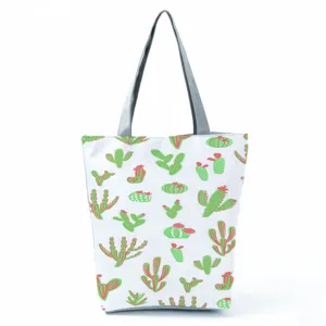 Casual τσάντα shopper από καμβά με φρέσκο ​​πράσινο print κάκτου και ανθεκτικά γκρι χερούλια.