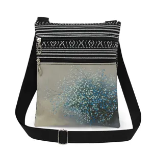 Floral print canvas crossbody bag with double zippers and adjustable strap for daily use